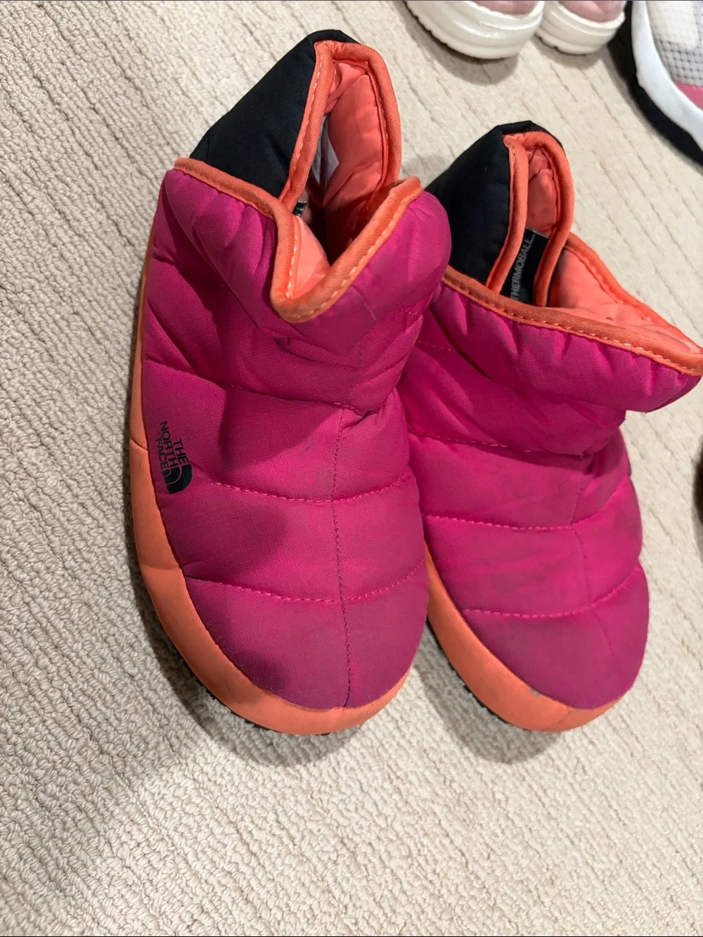 The North Face Kids Pink and Orange Puffy Slip-On Slippers